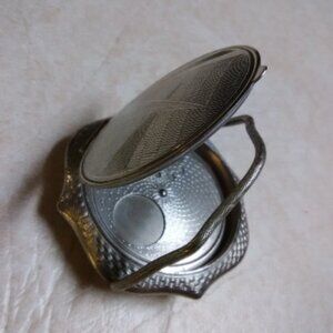 Vintage 1920's "whoopee" compact with a handle